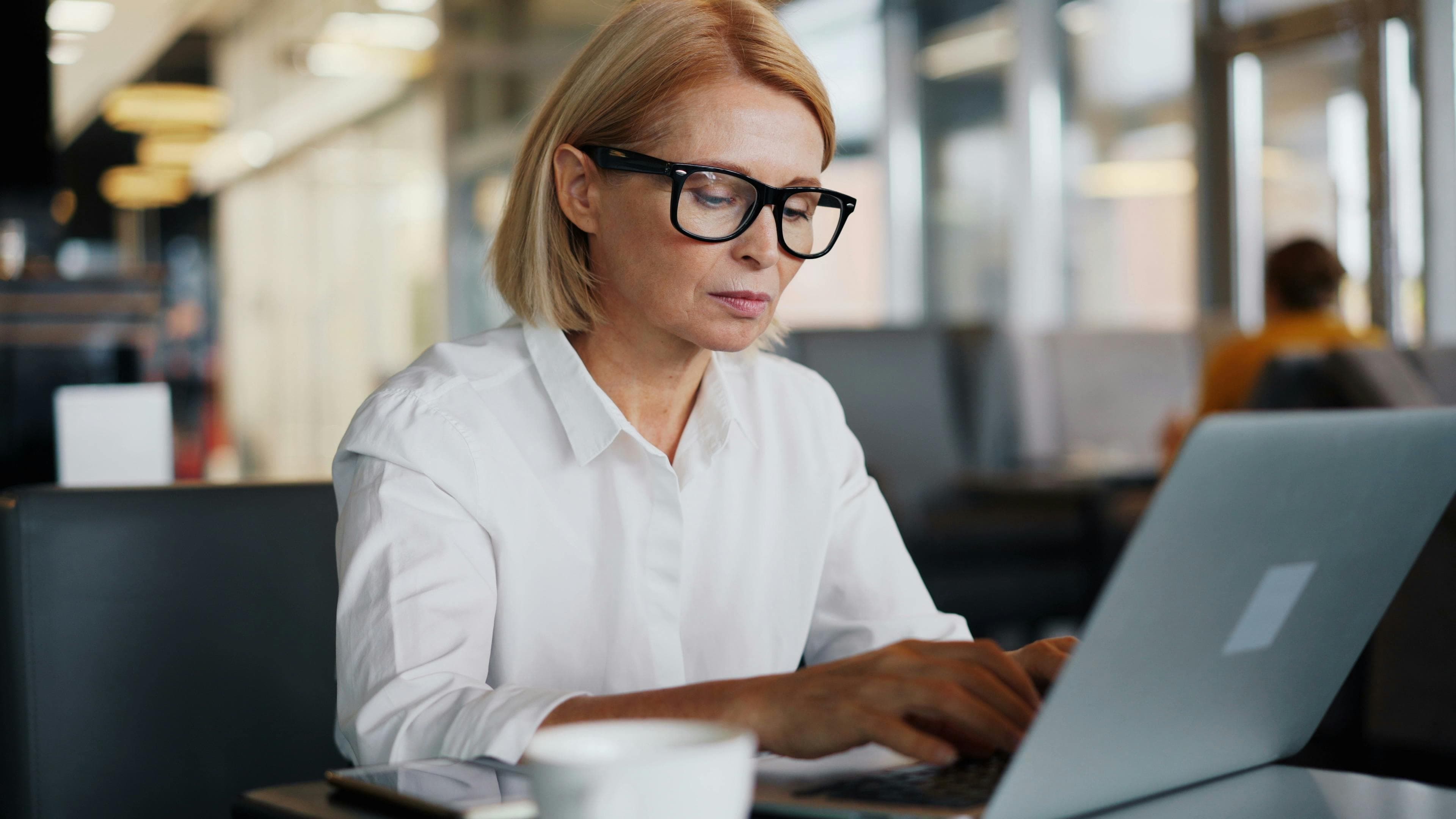 Blonde businesswoman working